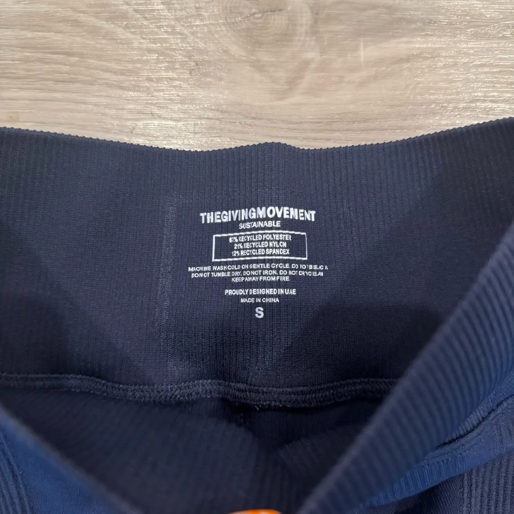 The Giving Movement Ribbed Flared Leggings in Navy - Picture 7 of 7